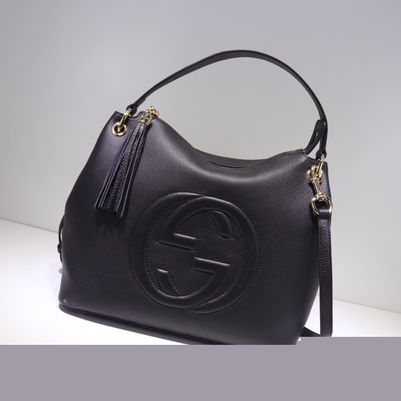 G*u*i top handle bags